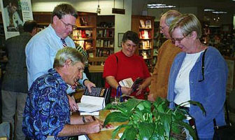 Dave signing at Books & Co., Dayton